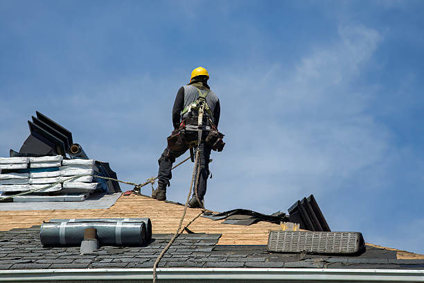 Professional Roofing technician working in Woodside, NY